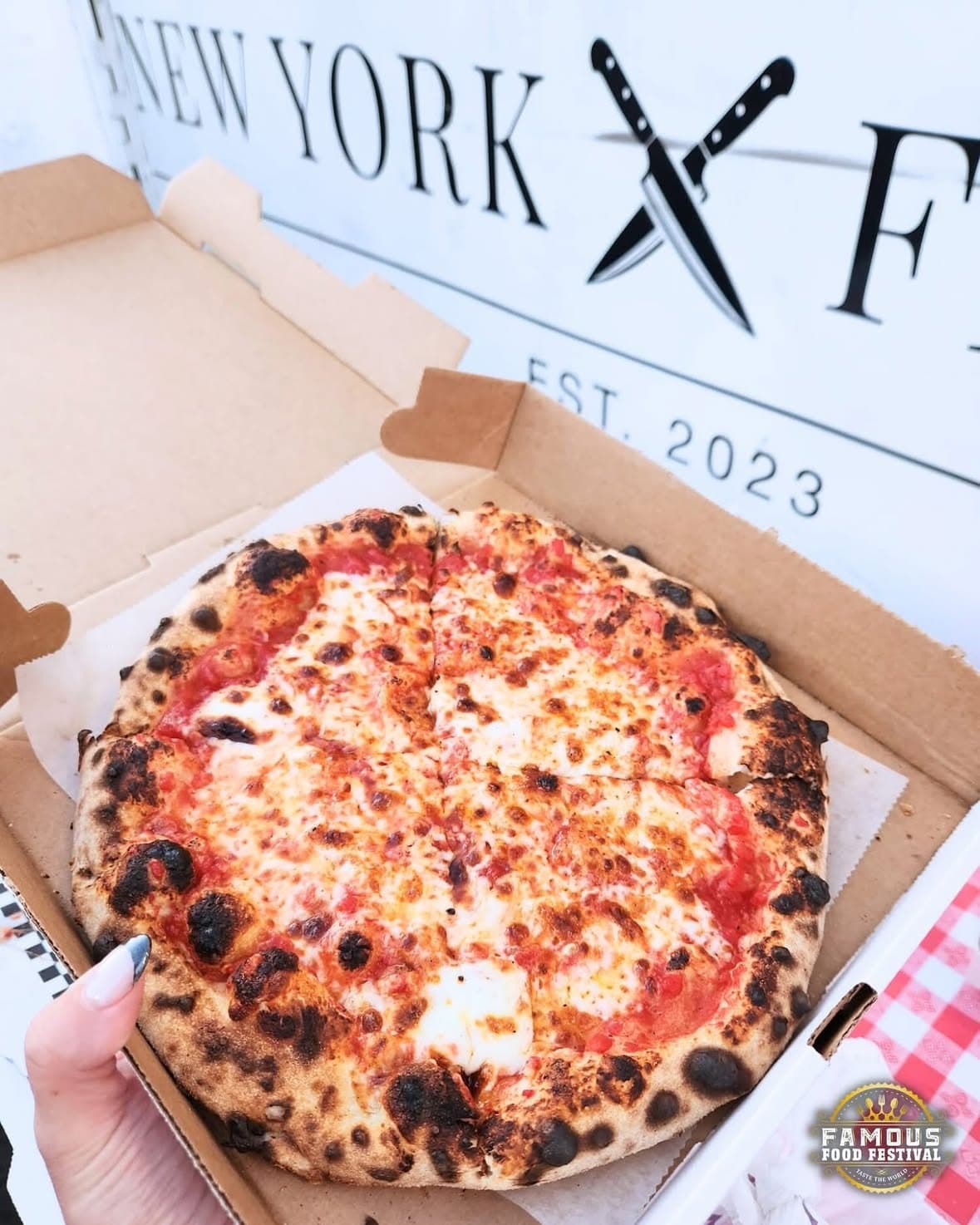 Mobile pizza truck serving guests at an NYC event